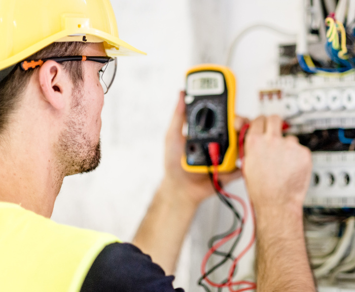 Electrician working on lights